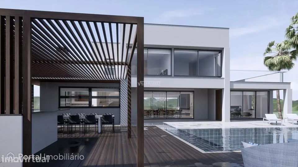 Luxuosa villa V4 de arquitetura moderna com piscina situada na zona d
