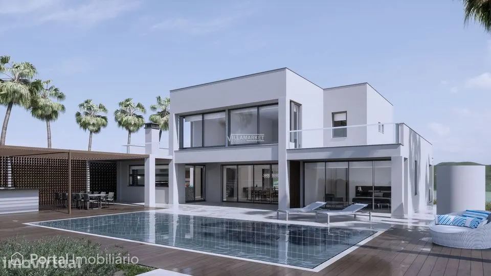 Luxuosa villa V4 de arquitetura moderna com piscina situada na zona d