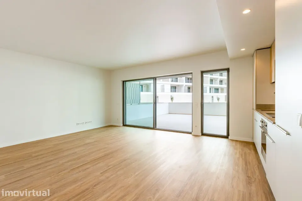 T2 Novo com terraço de 54m2 em condomínio privado c/ piscina em Loures