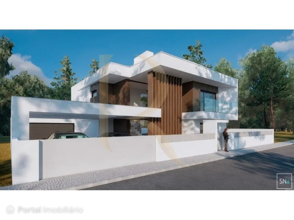 Moradia T4 isolada com piscina, churrasqueira e garagem na Aroeira