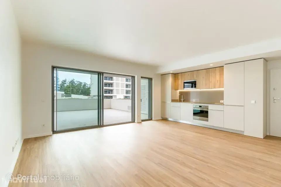 T2 Novo com terraço de 54m2 em condomínio privado c/ piscina em Loures